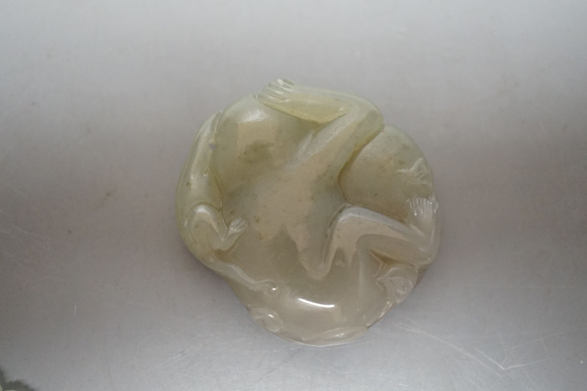 Four Chinese jade carvings of animals and fruit, tallest 4cm
